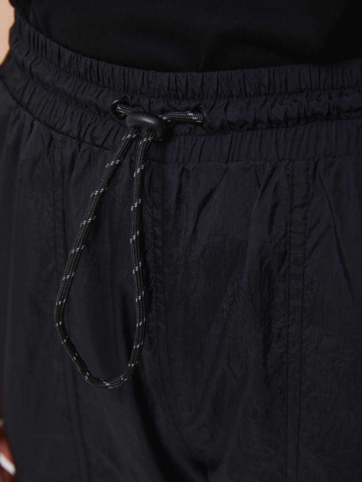 Нейлоновые брюки с накладными карманами (черный, L) от Sela