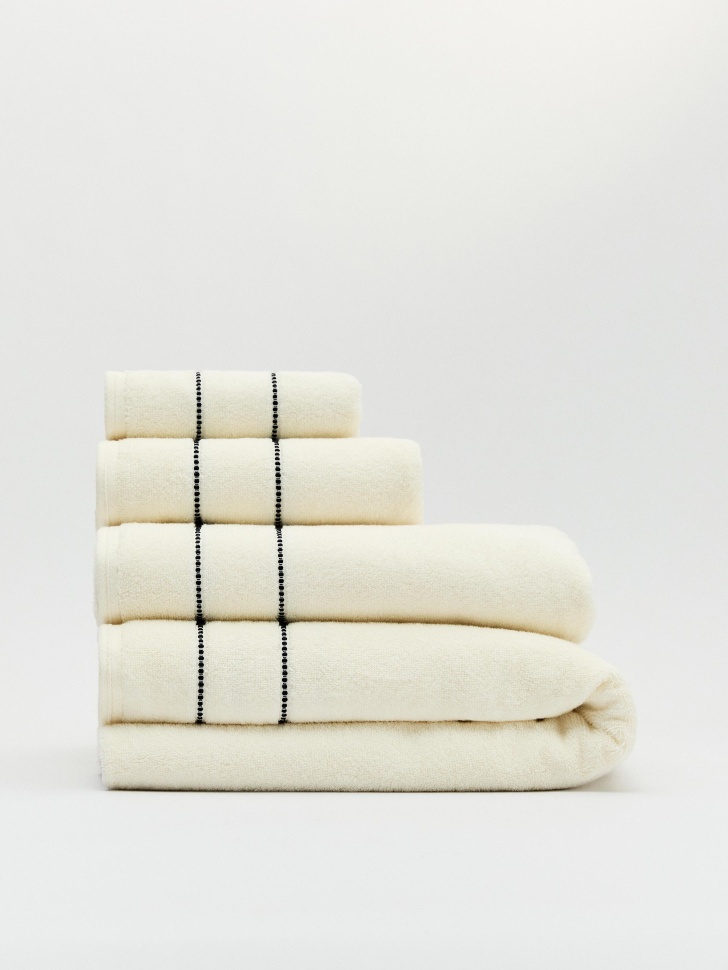 банное полотенце от бренда sela вид слева