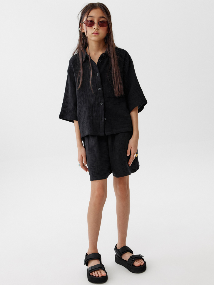 короткие шорты из муслина для девочек от бренда sela вид слева