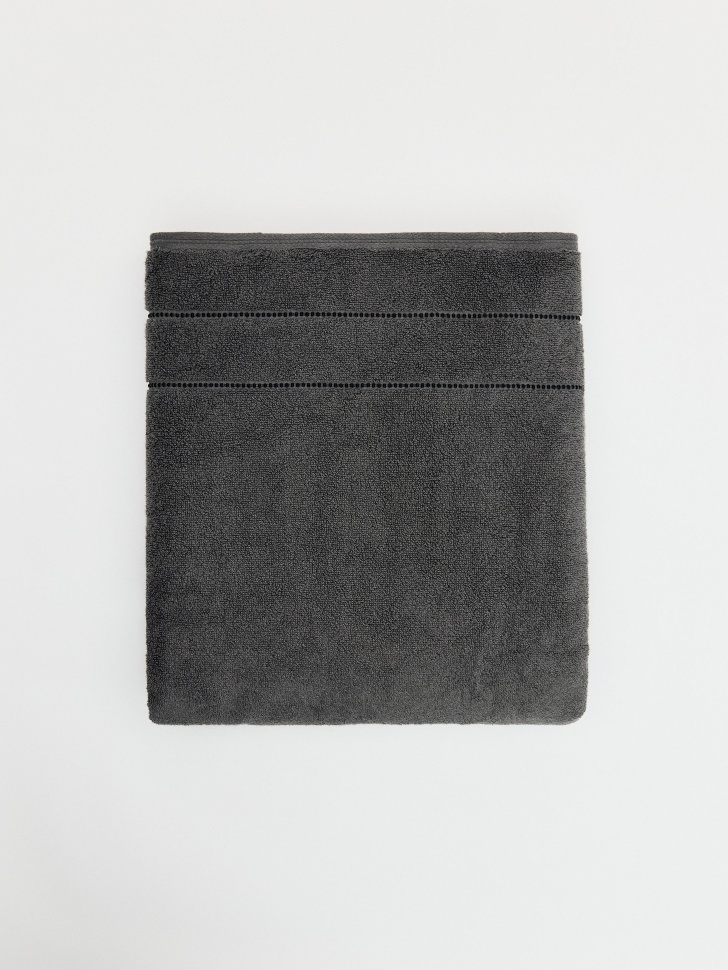 банное полотенце от бренда sela вид слева