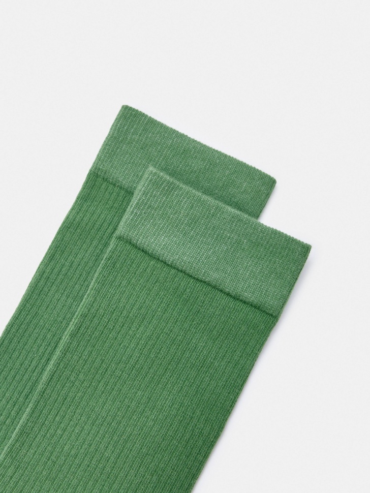 длинные носки от бренда sela вид слева