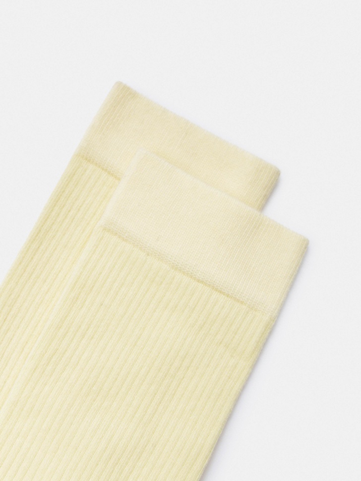 длинные носки от бренда sela вид слева