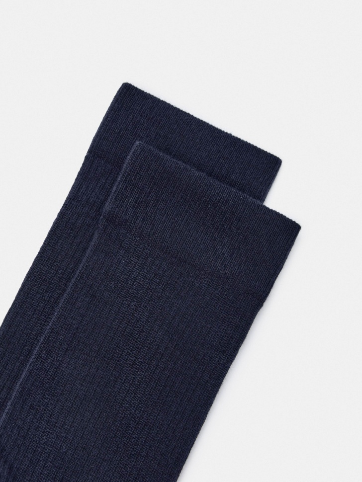 длинные носки от бренда sela вид слева