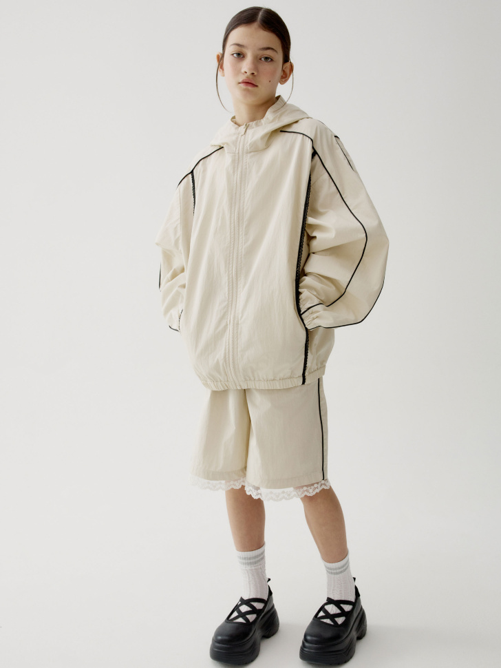 ветровка из смесового хлопка для девочек от бренда sela вид слева