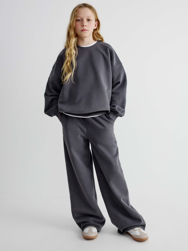 трикотажные широкие брюки для девочек от бренда sela вид слева