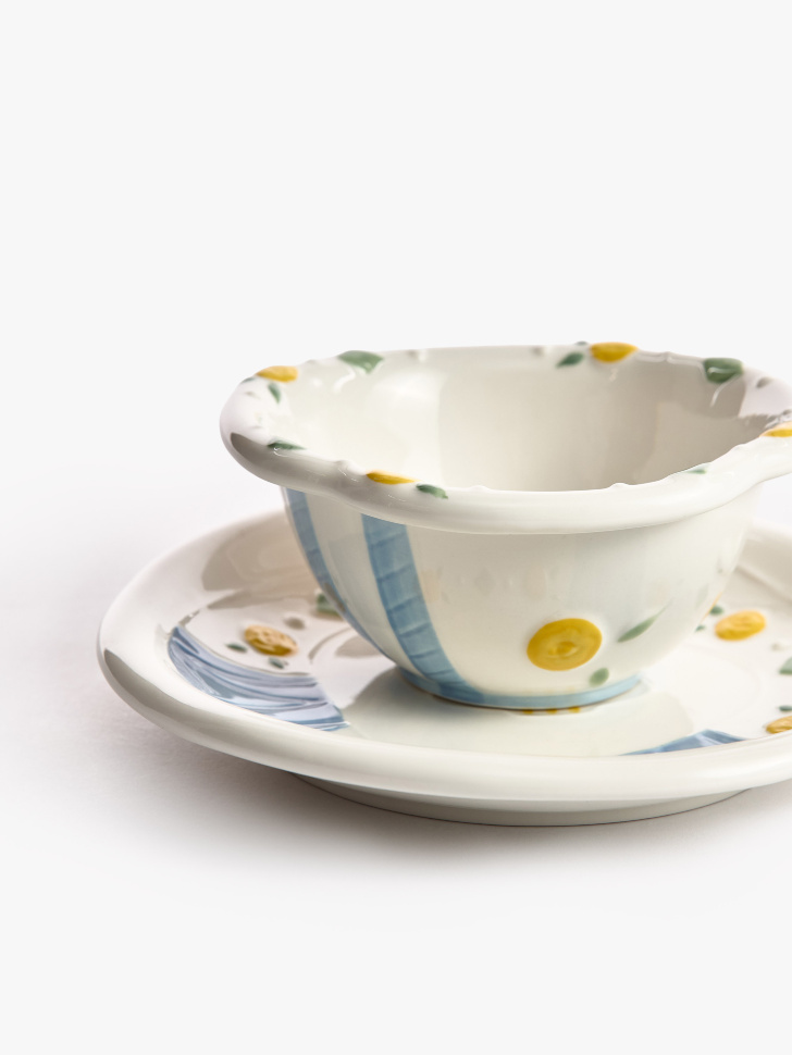 детская глубокая тарелка из фаянса с рисунком от бренда sela вид слева