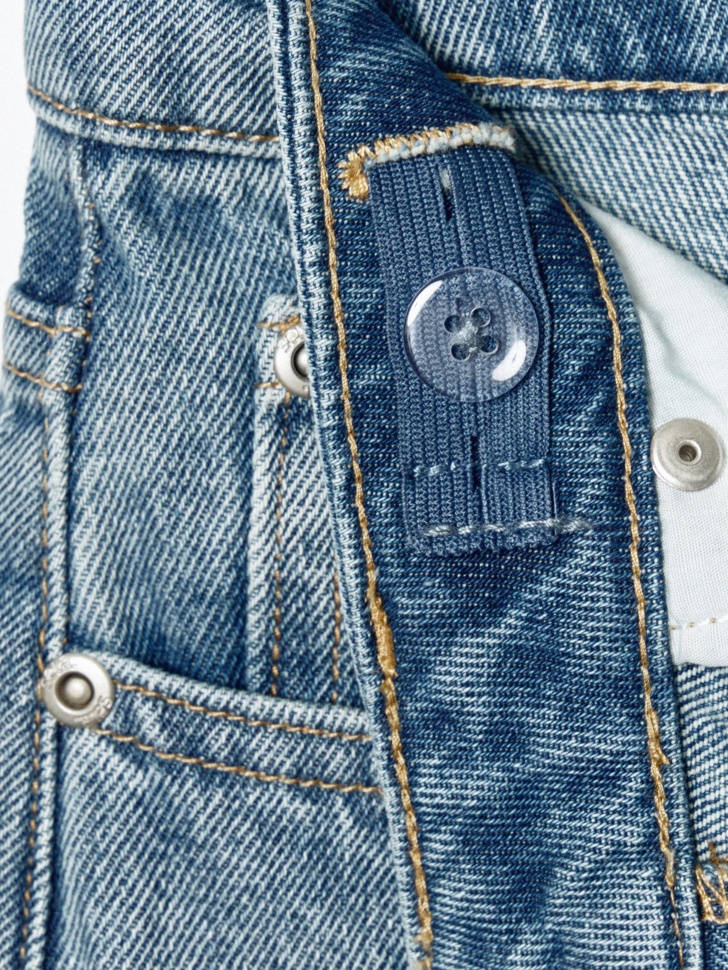 широкие джинсы с вышивкой для девочек из россии вид сбоку