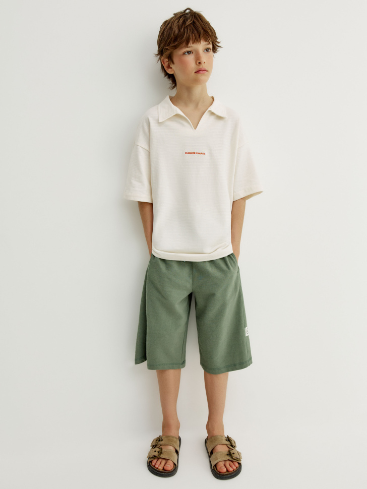 поло оверсайз с вышивкой для мальчиков от бренда sela вид слева