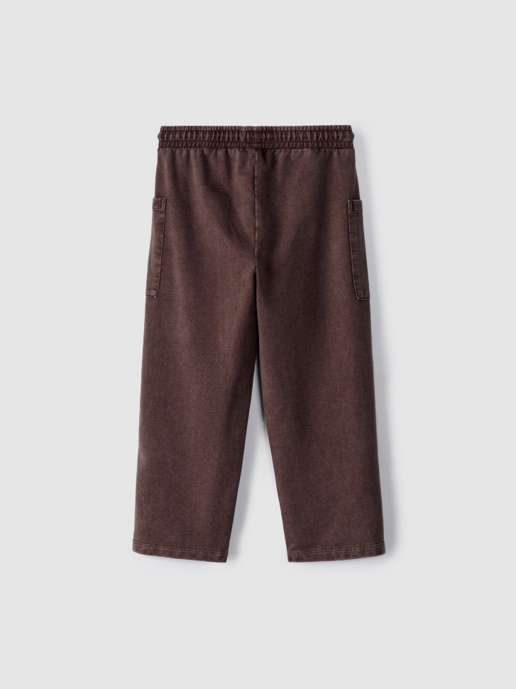 трикотажные брюки с эффектом стирки для мальчиков от бренда sela вид слева