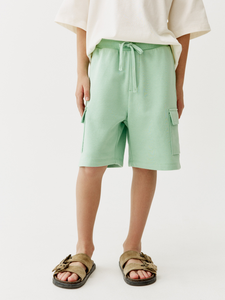 трикотажные шорты-карго для мальчиков от бренда sela вид слева