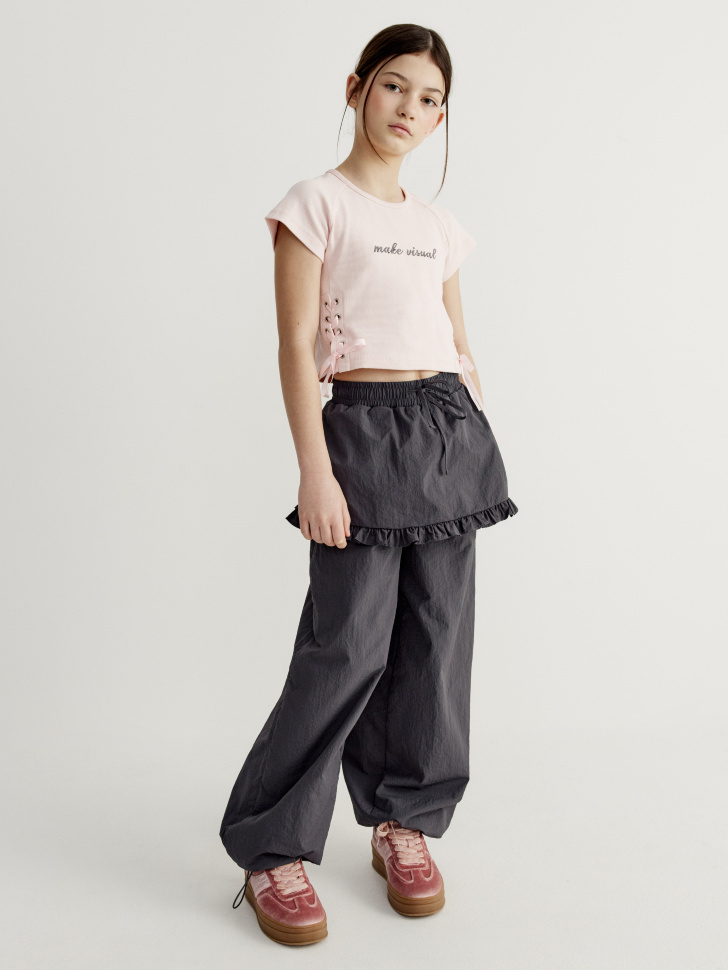 утепленные нейлоновые брюки с юбкой для девочек от бренда sela вид слева