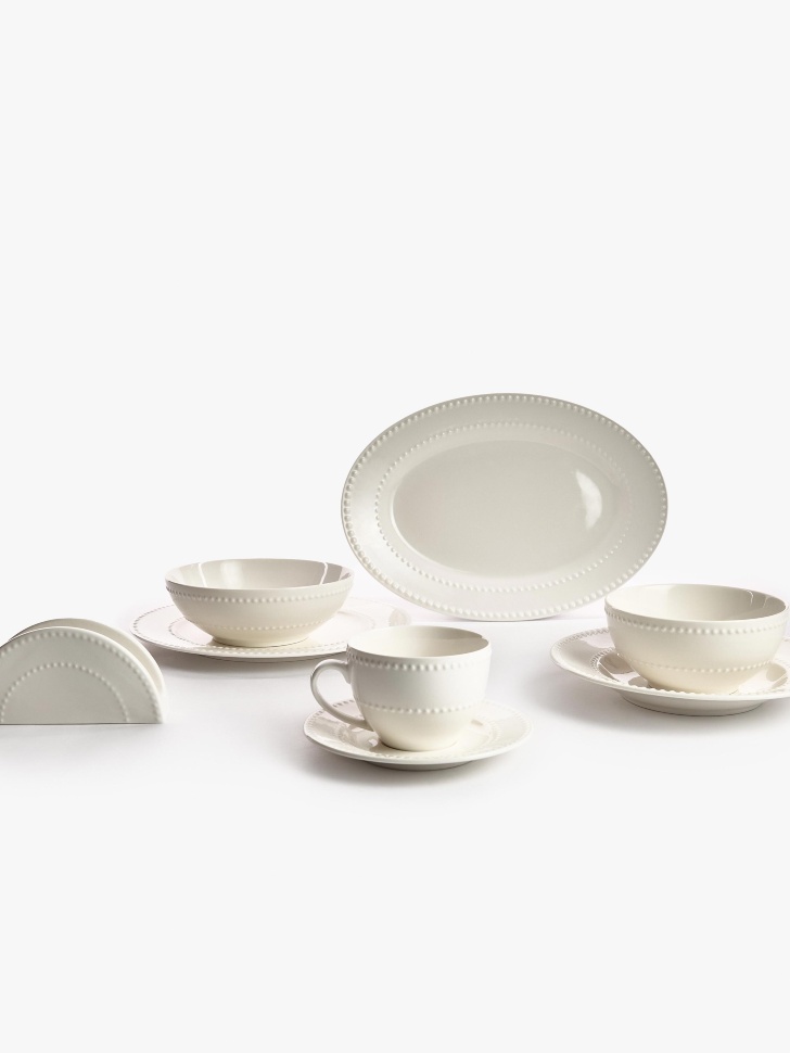 глубокая тарелка из костяного фарфора от бренда sela вид слева