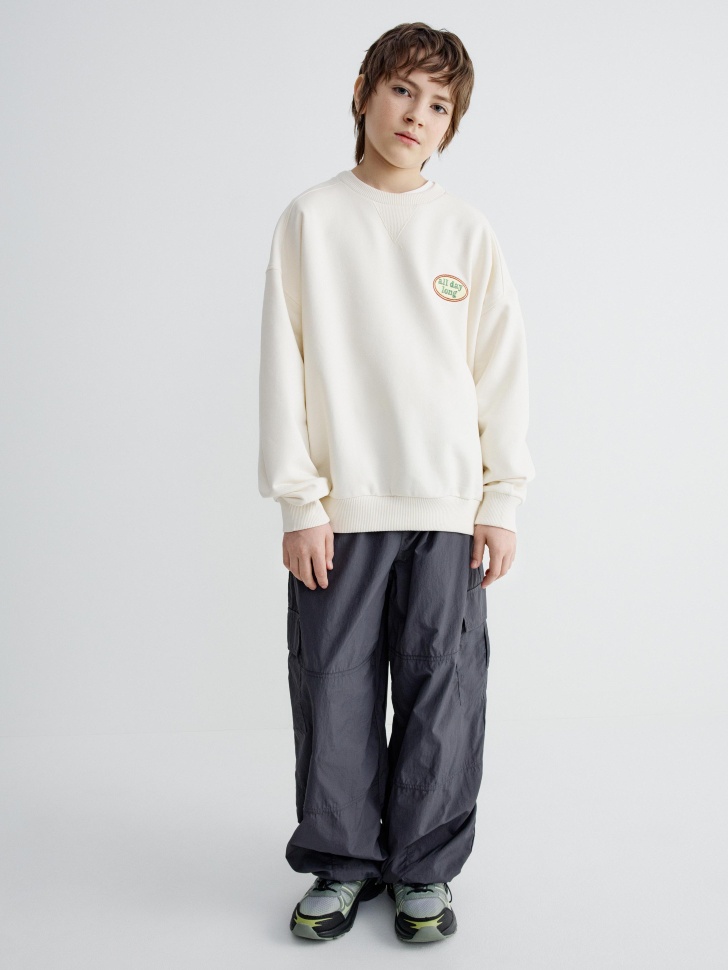 свитшот оверсайз с принтом для мальчиков от бренда sela вид слева